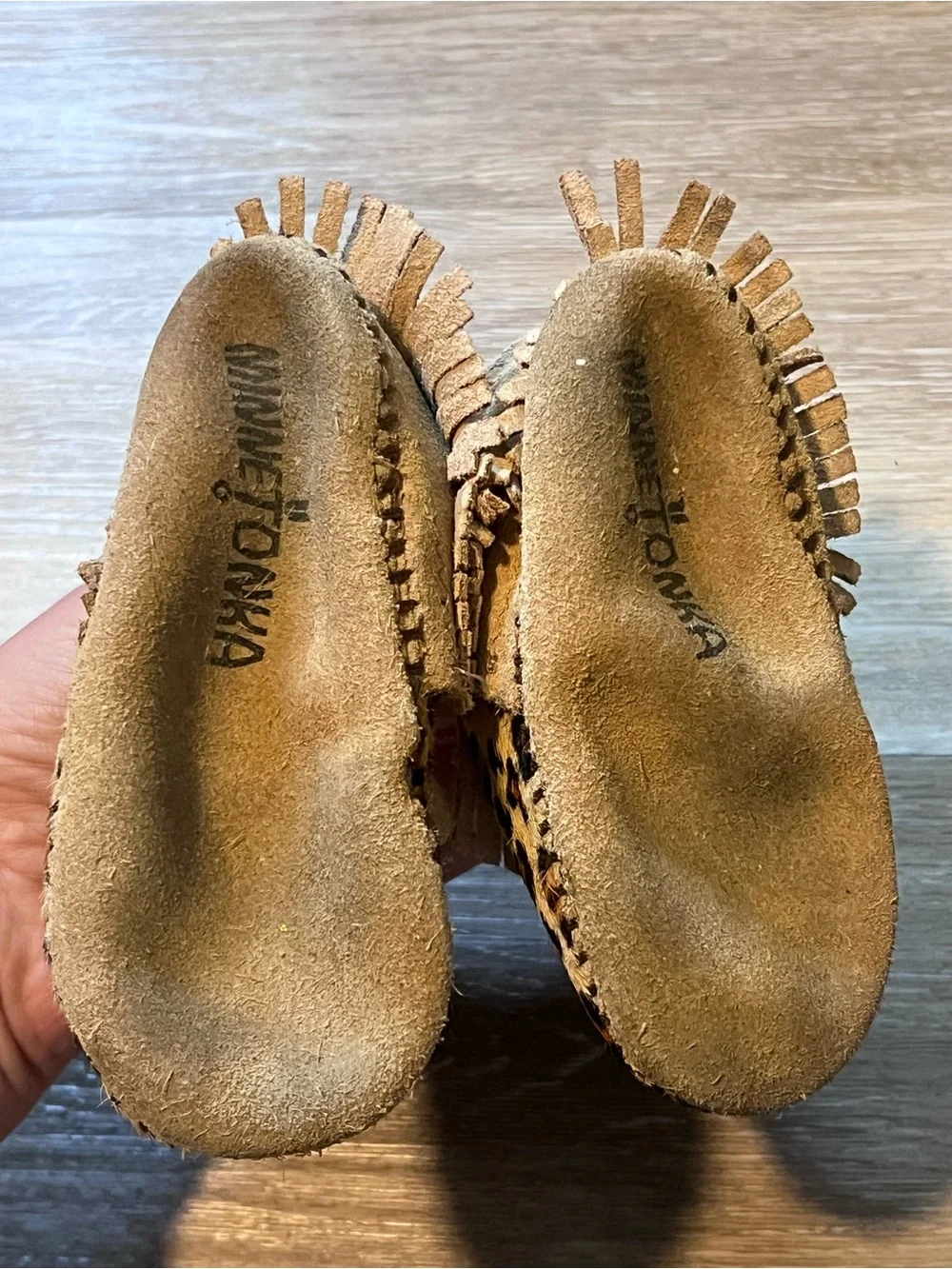 Minnetonka • size 5 • leather Kids Leopard Print Fringe Moccasin Slip-Ons - Tan